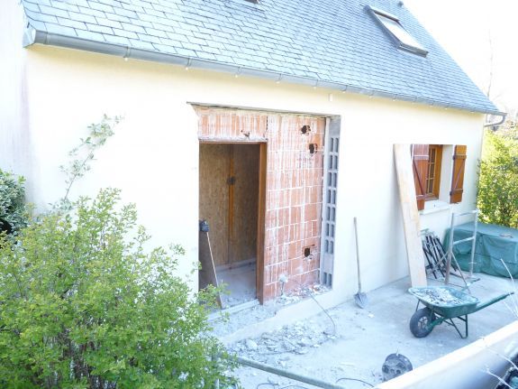 Percement de mur pour mise en place d'une baie vitrée
